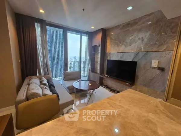 Luxurious high-rise living room with stunning city view and modern decor.