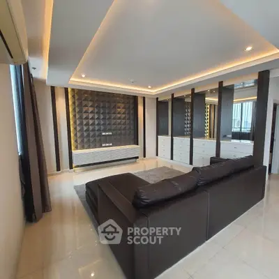Luxurious modern living room with stylish leather sofa and ambient lighting