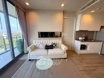 Modern living room with balcony view and stylish white sofa