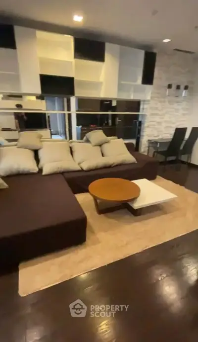 Stylish modern living room with cozy sectional sofa and chic decor