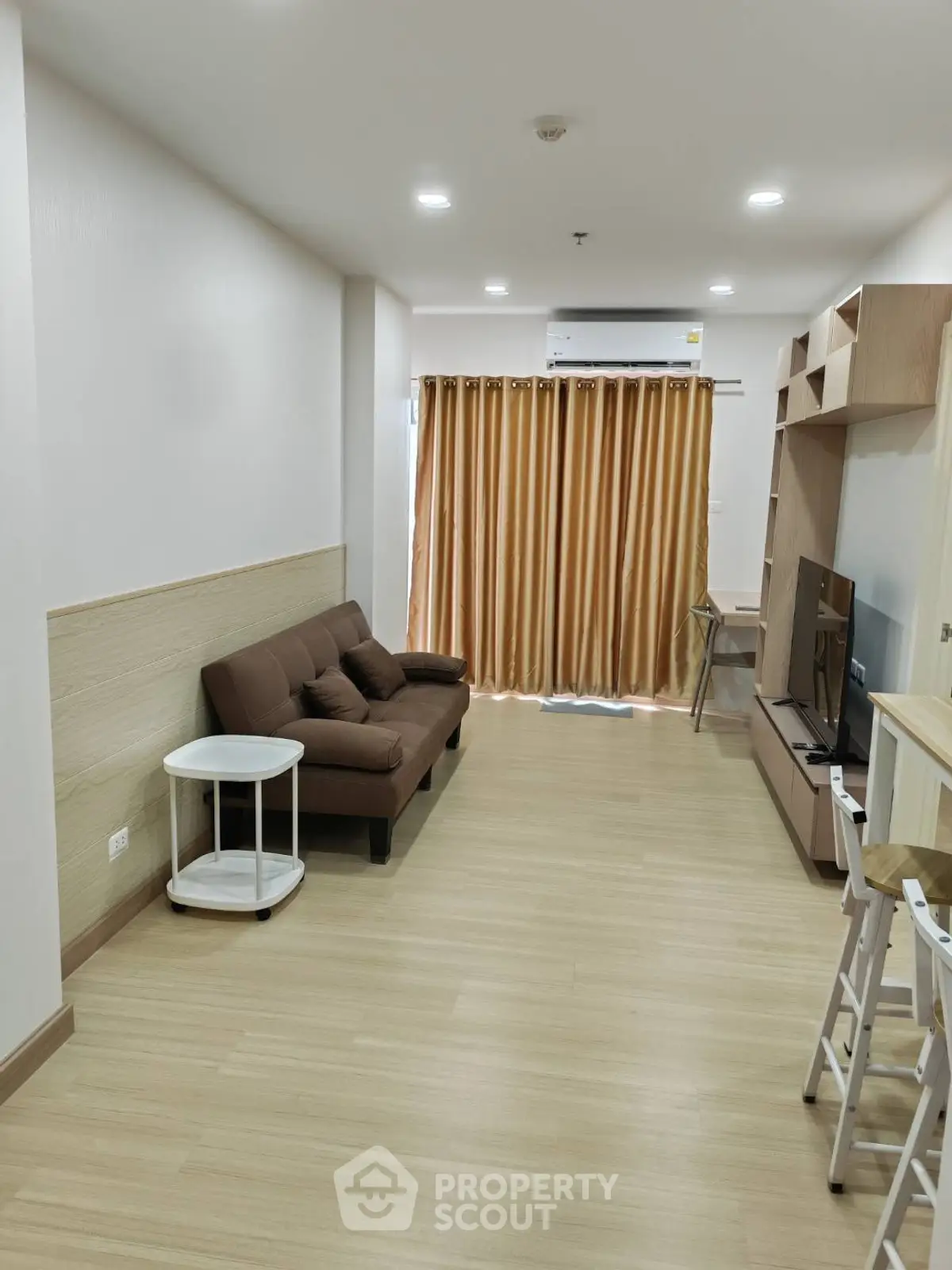 Modern living room with cozy sofa and stylish decor
