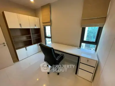Modern study room with sleek desk and ergonomic chair, perfect for productivity and comfort.
