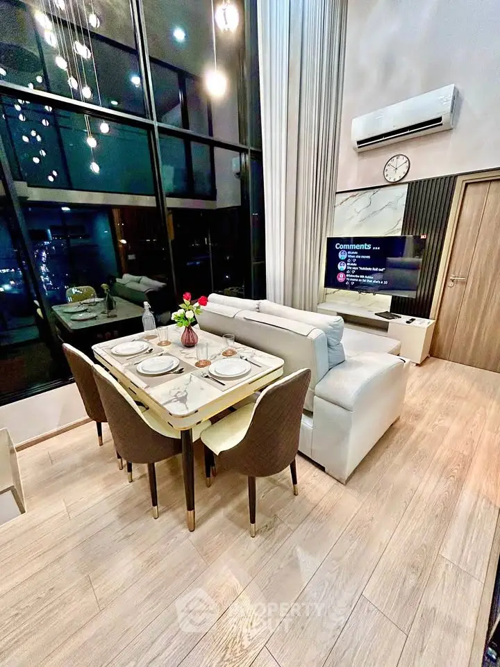 Luxurious modern living room with high ceilings and elegant dining area, featuring floor-to-ceiling windows.