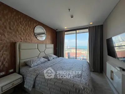 Luxurious bedroom with stunning city view and modern decor