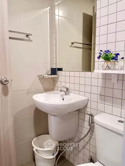 Modern bathroom with sleek fixtures and stylish tile design, perfect for contemporary living.