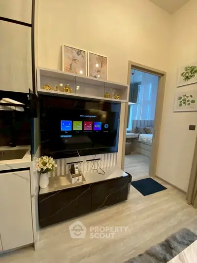 Modern living room with sleek TV setup and stylish decor