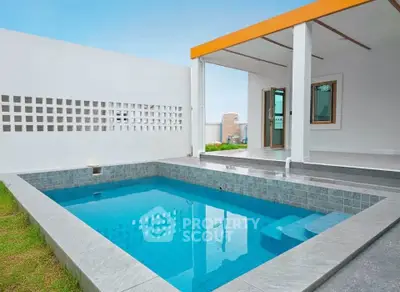 Modern villa with private pool and stylish patio, perfect for luxury living.