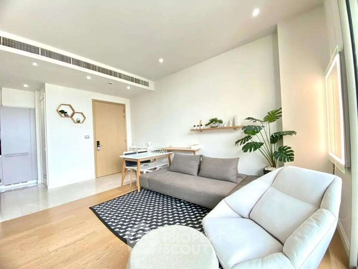 Modern living room with stylish furniture and natural light