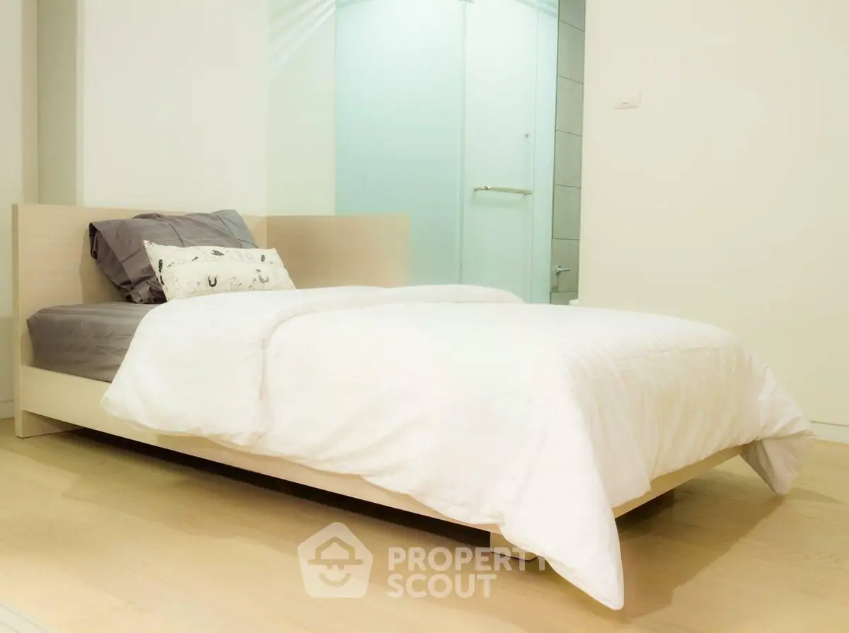 Cozy minimalist bedroom with modern design and soft lighting