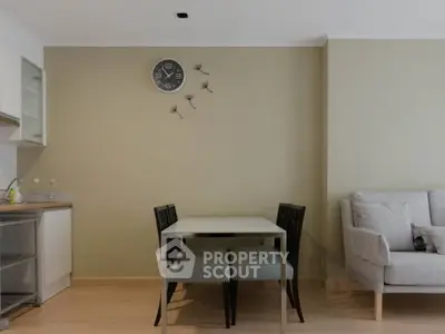 Modern living room with dining area and minimalist decor