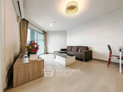 Spacious modern living room with elegant decor and natural light