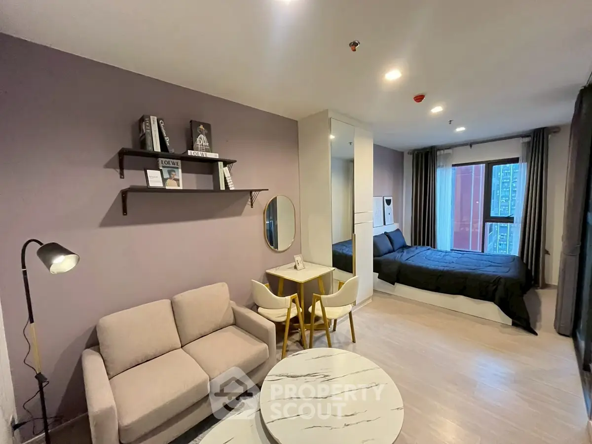 Modern studio apartment with stylish decor and cozy living area