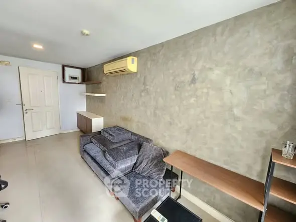 Modern living room with minimalist design and air conditioning