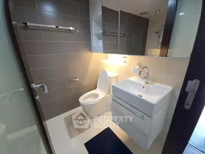 Modern bathroom with sleek fixtures and stylish tile design
