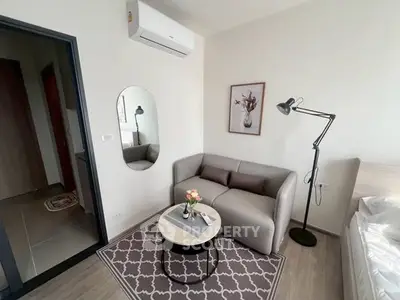 Modern living room with stylish decor and cozy seating area