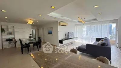 Spacious modern living room with open layout and city view, featuring elegant dining area and stylish decor.