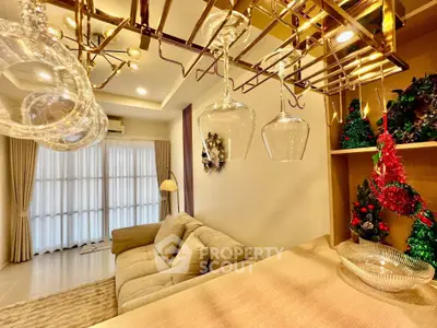 Stylish living room with cozy sofa and elegant glass rack, perfect for entertaining guests.