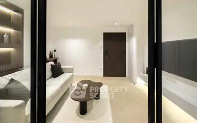 Modern living room with sleek design and cozy ambiance