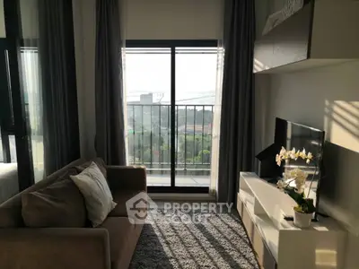 Modern living room with cozy sofa and scenic balcony view