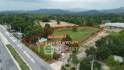 Expansive land plot for sale with road access and mountain views