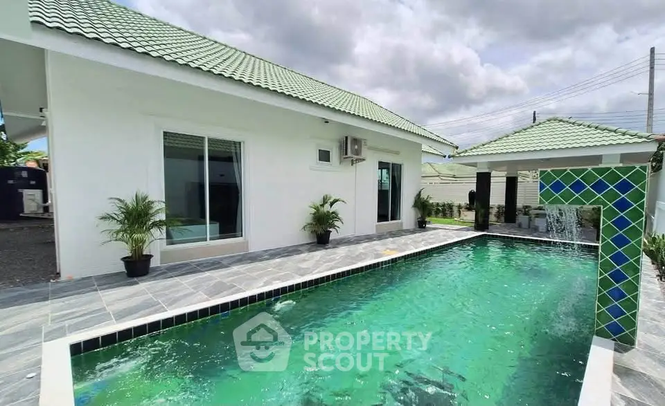 Stunning modern home with private pool and lush greenery, perfect for luxury living.