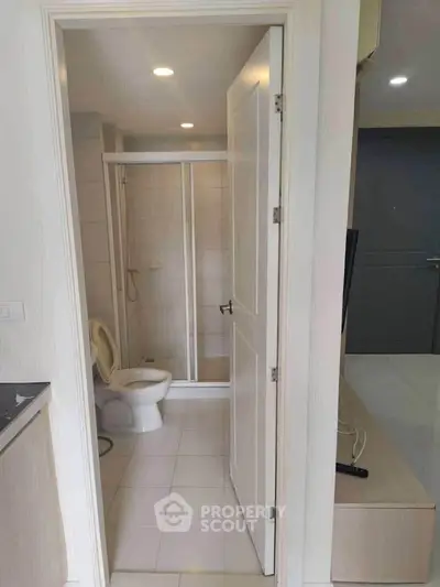 Modern bathroom with shower and toilet in a contemporary apartment