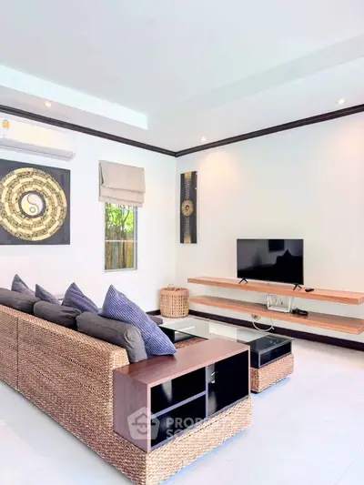 Stylish living room with modern decor and comfortable seating in a bright, airy space.