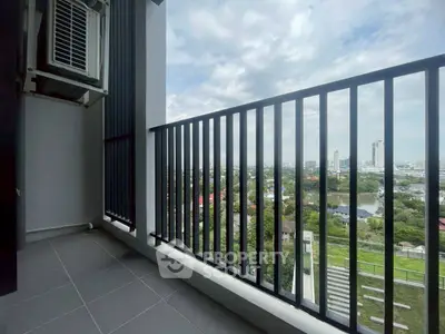 Stunning balcony view with cityscape and lush greenery, perfect for relaxation and enjoying the skyline.