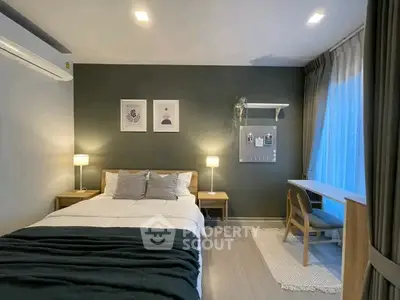 Modern bedroom with stylish decor and natural light