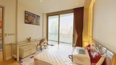 Luxurious bedroom with stunning city view and modern furnishings