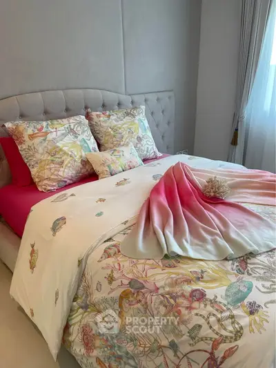 Charming bedroom with elegant decor and natural light, perfect for relaxation.