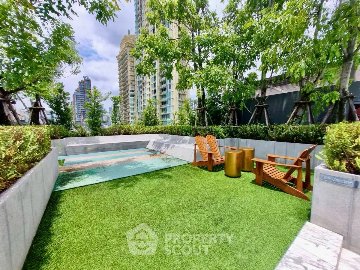 Luxurious rooftop garden with seating area and city views, perfect for relaxation and gatherings.