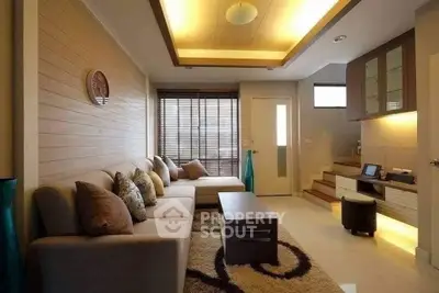 Modern living room with stylish decor and cozy seating area