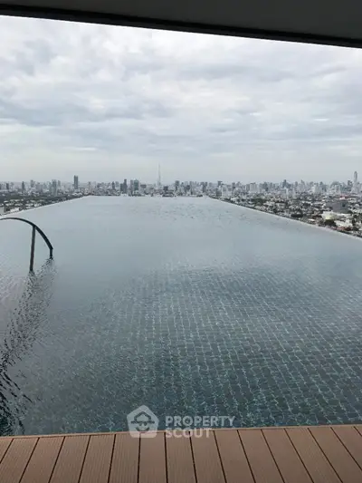 Stunning rooftop infinity pool with panoramic city skyline view