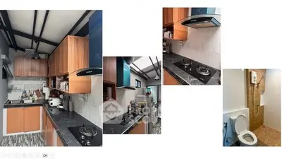 Modern kitchen with gas stove and sleek cabinetry, plus a compact bathroom.
