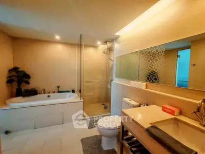 Luxurious bathroom with modern fixtures and spacious shower area