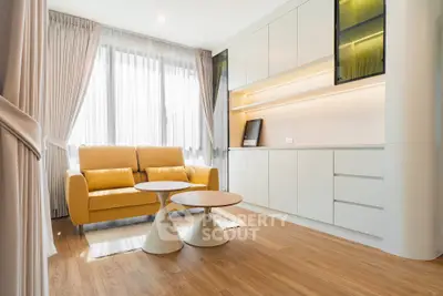 Modern living room with yellow sofa and stylish coffee tables