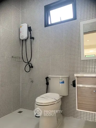 Modern bathroom with sleek fixtures and stylish tile design