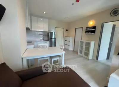 Modern open-plan living room with kitchen in stylish apartment