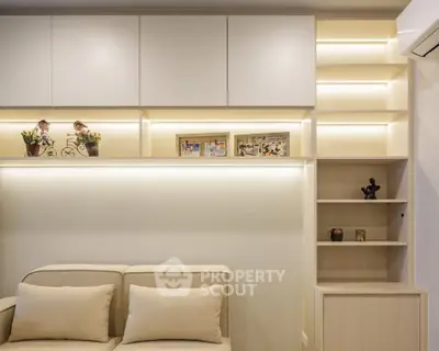 Modern living room with stylish shelving and cozy seating area