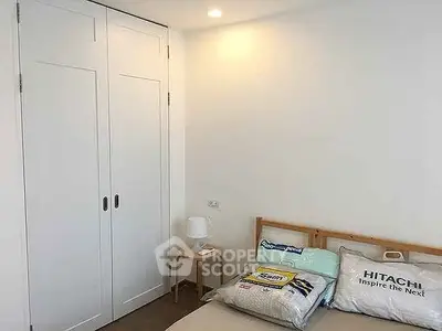 Cozy bedroom with built-in closet and modern decor