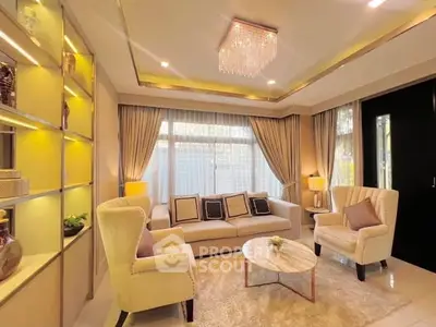 Luxurious living room with elegant chandelier and cozy seating area