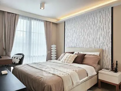 Modern bedroom with stylish decor and natural light, featuring a cozy bed and elegant furnishings.