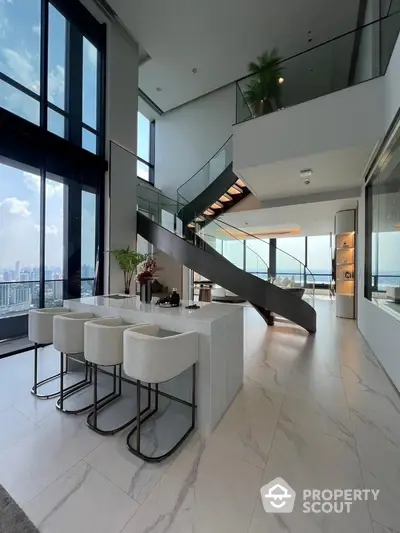 Luxurious modern living room with high ceilings and stunning city view