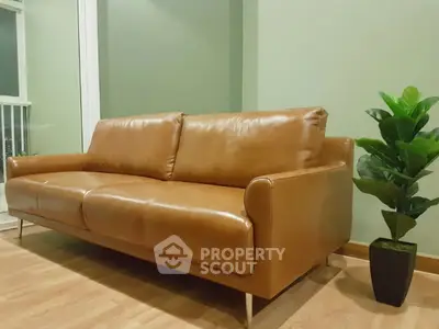 Stylish living room with modern leather sofa and elegant decor