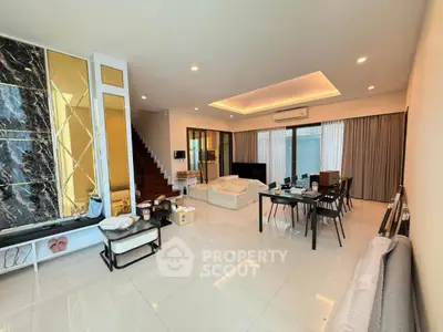 Spacious modern living room with elegant decor and open layout