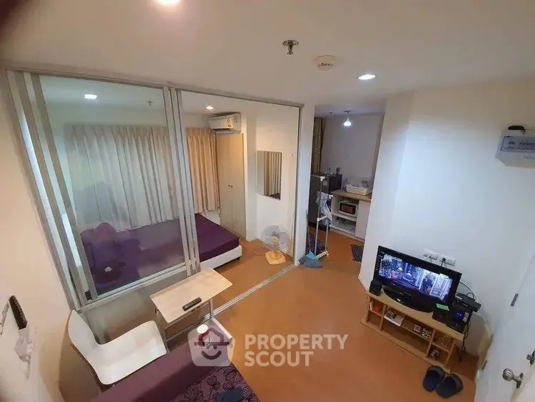 Modern studio apartment with open layout and cozy furnishings