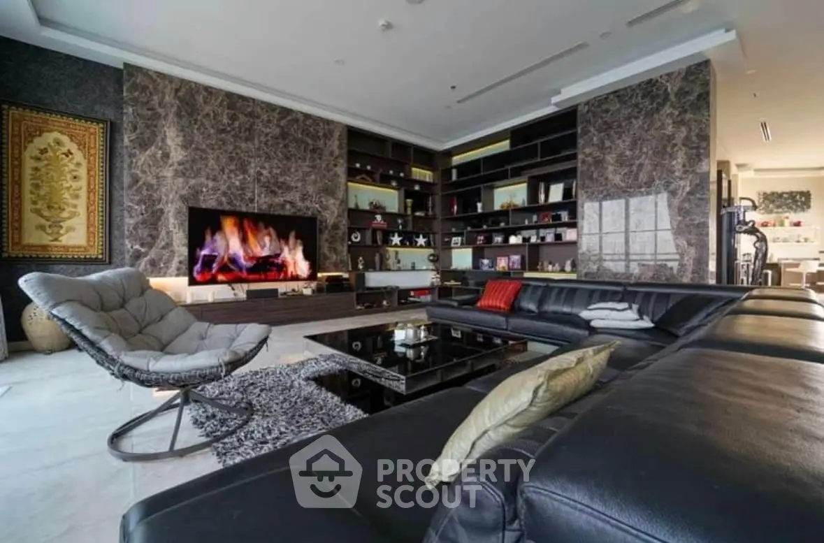 Luxurious modern living room with elegant marble walls and cozy fireplace