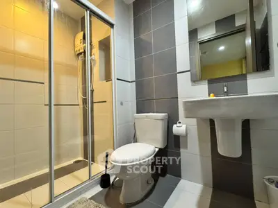 Modern bathroom with sleek shower and stylish tile design