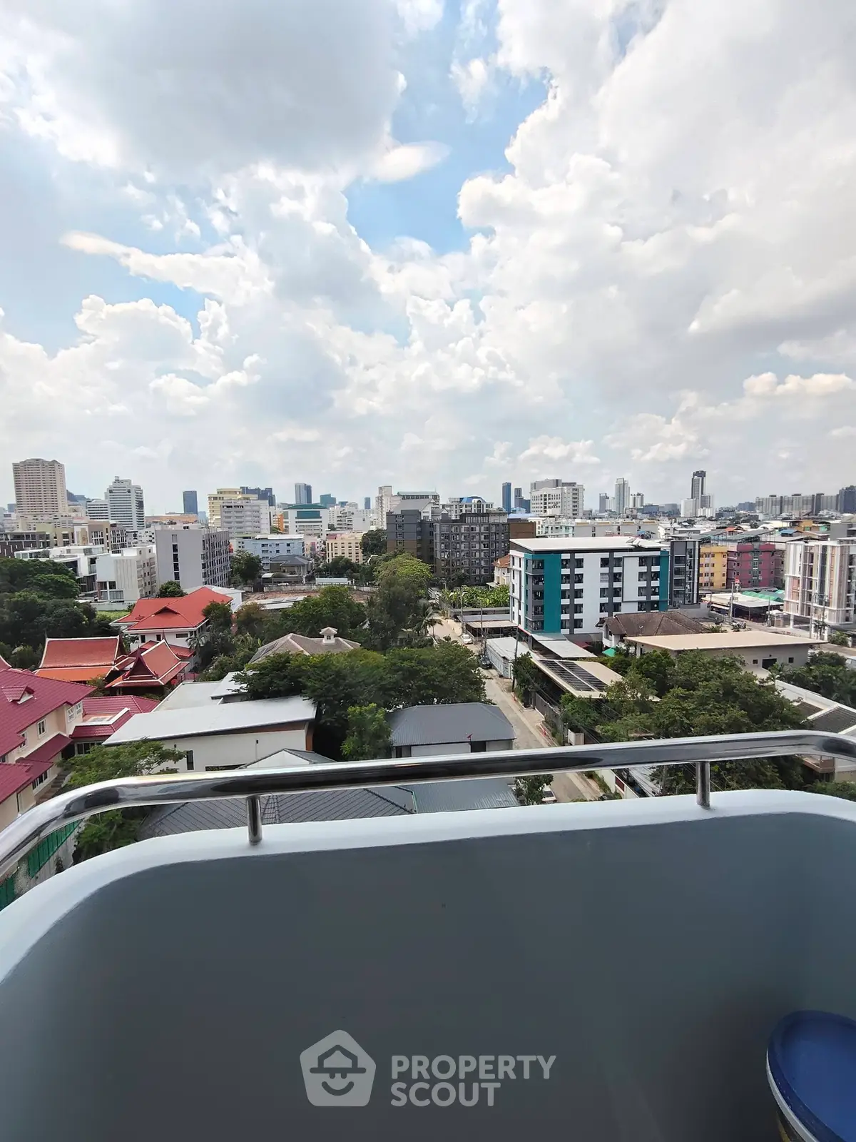 Stunning cityscape view from a high-rise balcony, perfect for urban living enthusiasts.
